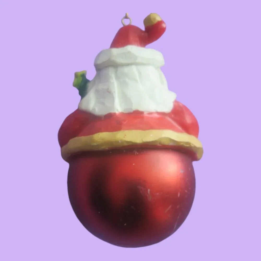 Round ball ornament bottom Santa with tree on hat and in hand in red and white